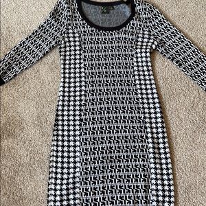 Black and white patterned sweater dress.